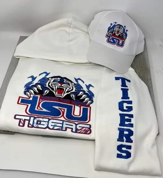 TSU Tigers embroidery on a matching white cap and garment