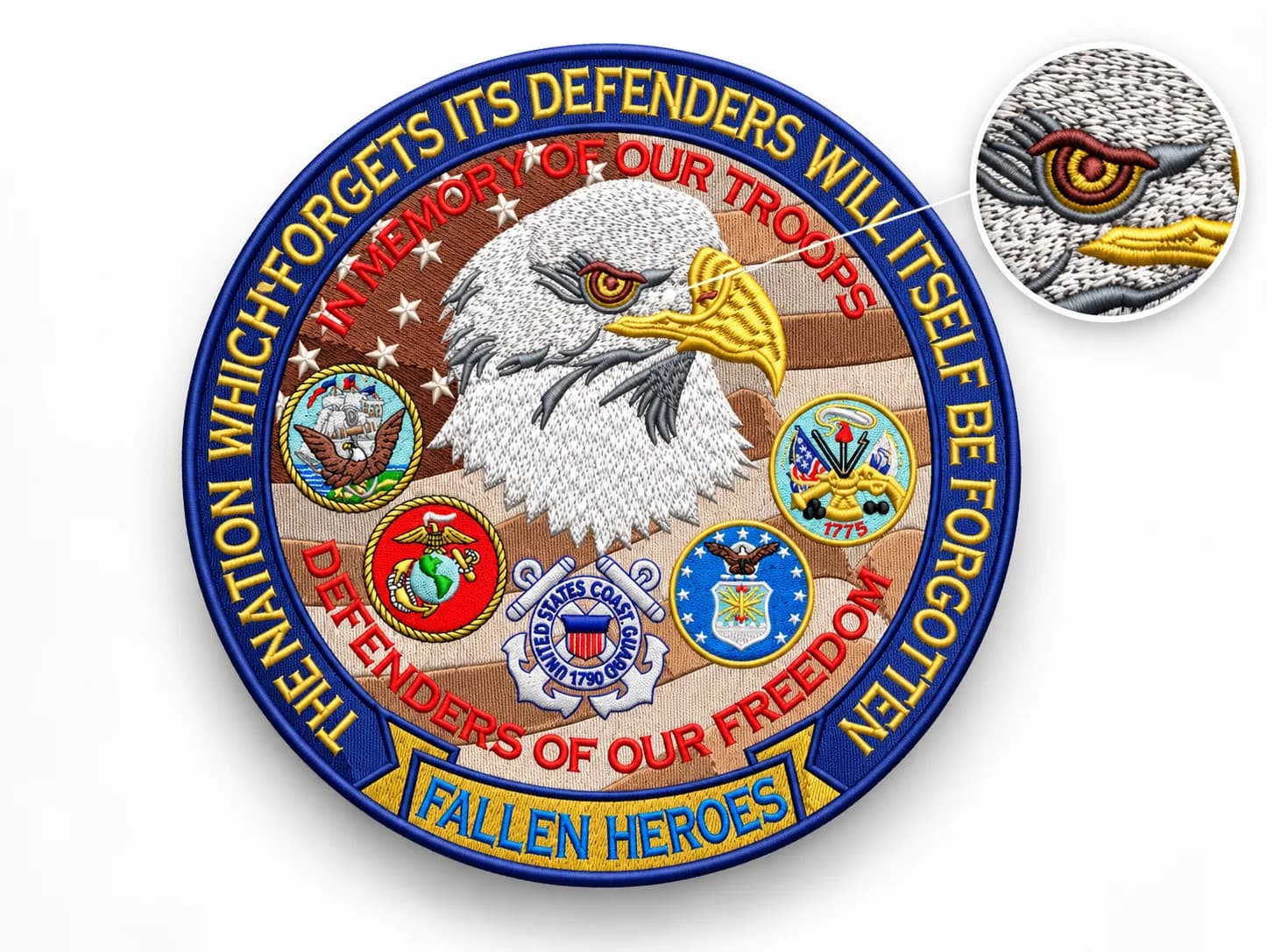 Circular eagle remembrance emblem with military symbols and Fallen Heroes lettering