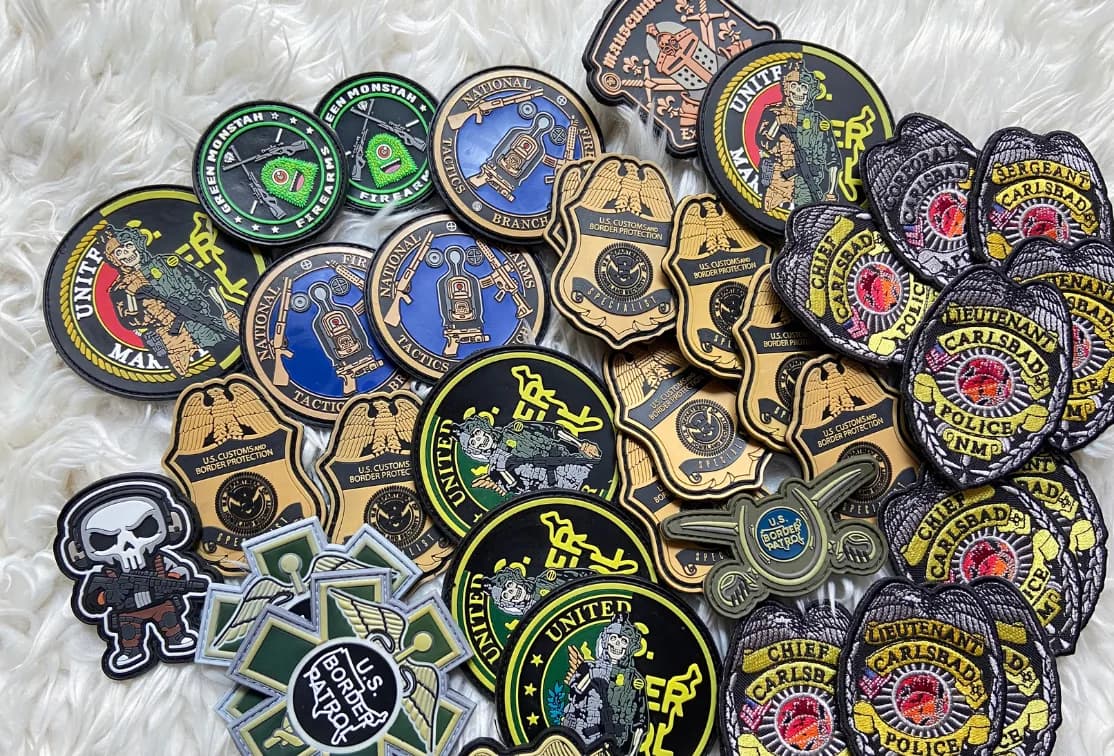 Assorted round and shield-shaped patches